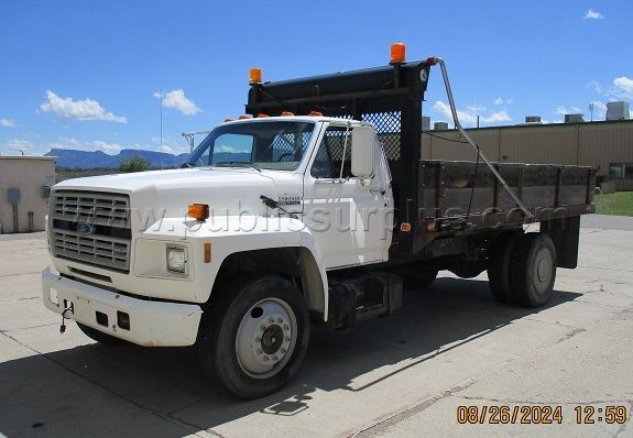 unit 968 - photo of a Ford F700 dump truck up for public auction