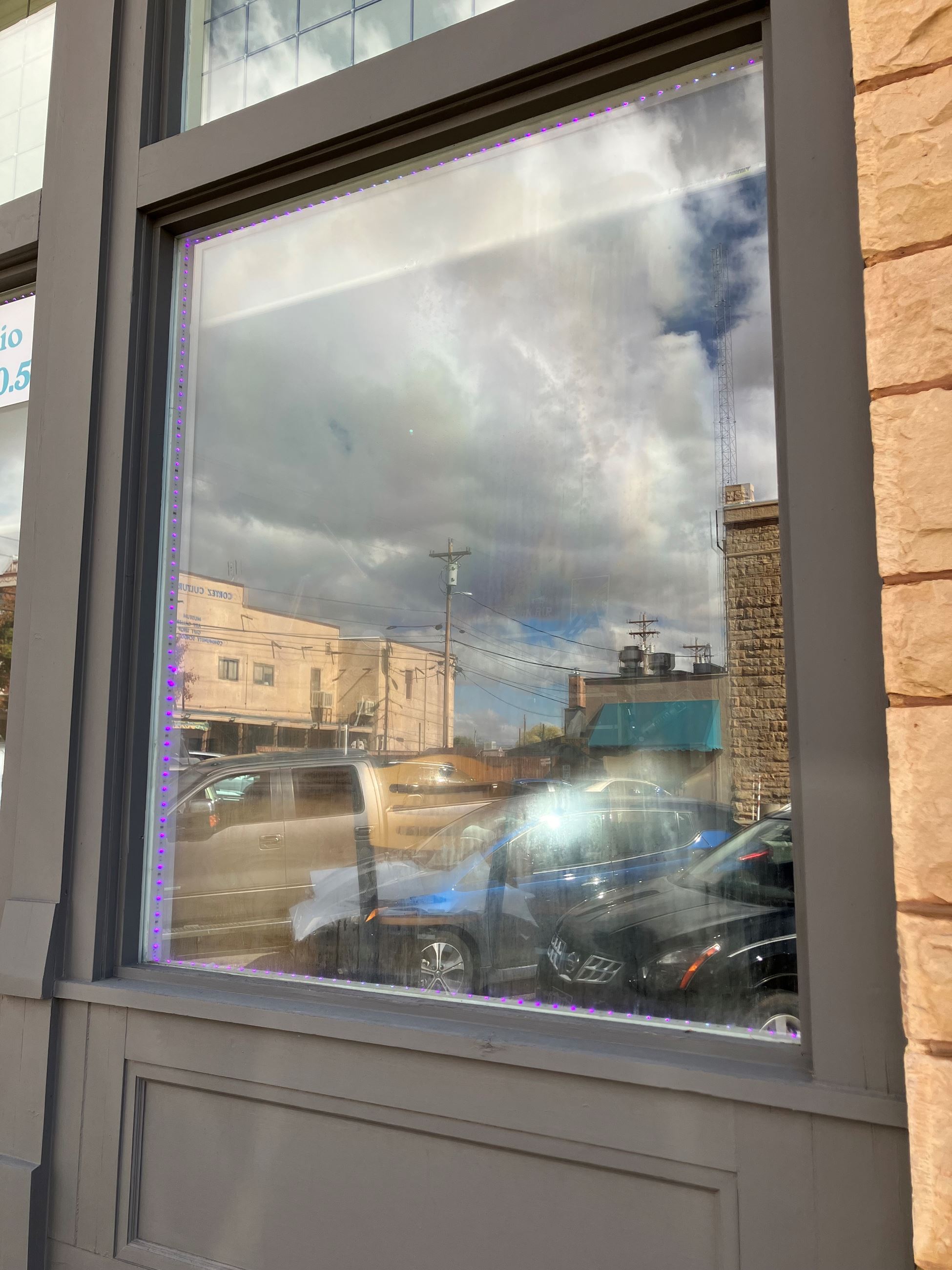 KSJD studio window exterior BEFORE